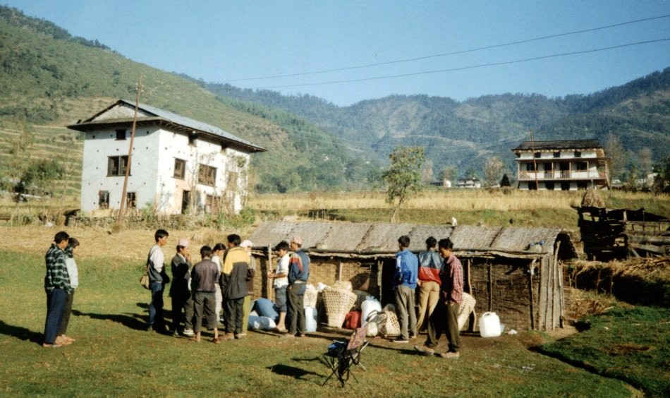Hiring Porters at camp site at the trek starting point in Jiri