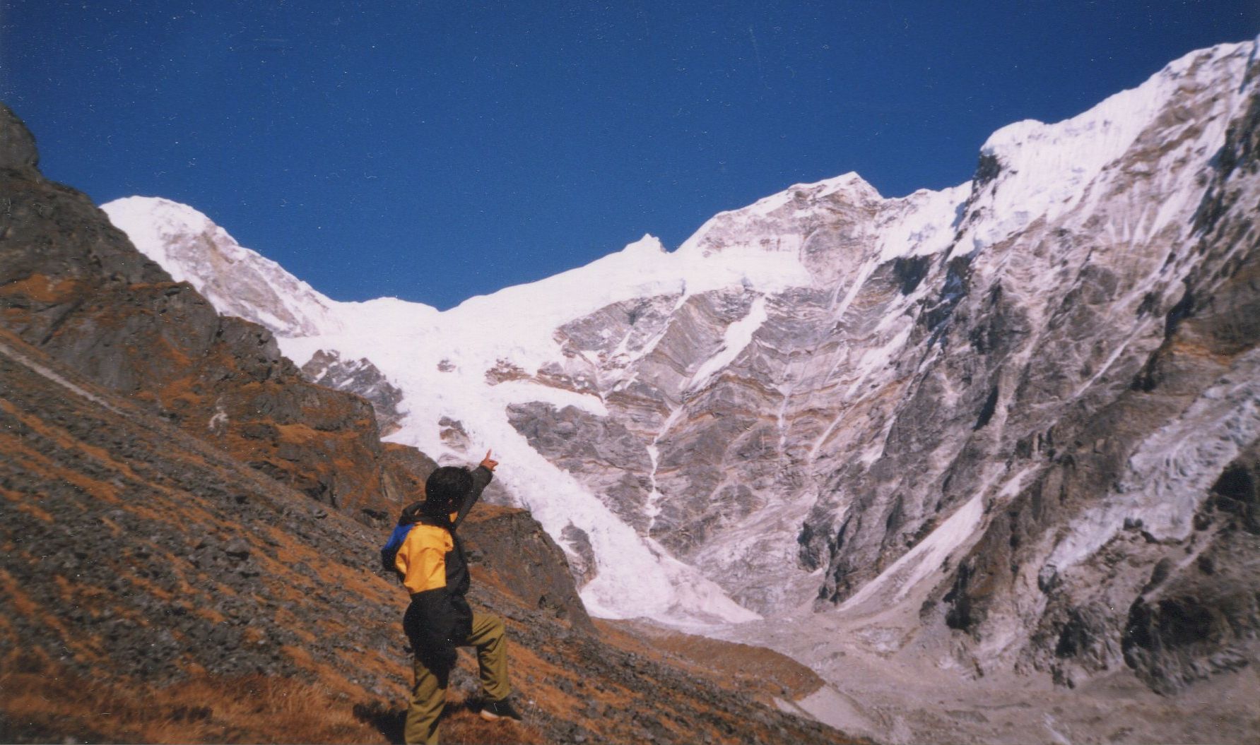 Darwa Sherpa beneath the Zurmacher Glacier at the head of the Likhu Khola Valley