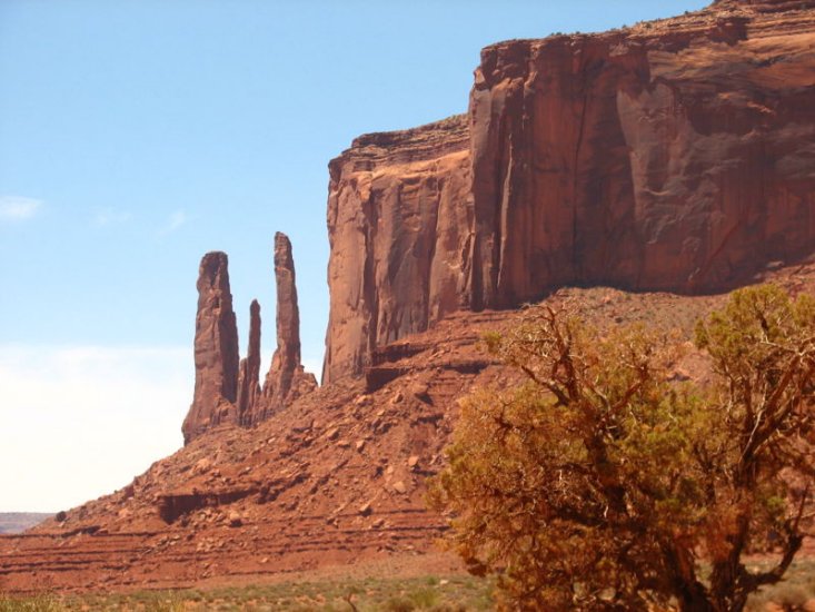 "Three Sisters" sandstone spires in Monument Valley