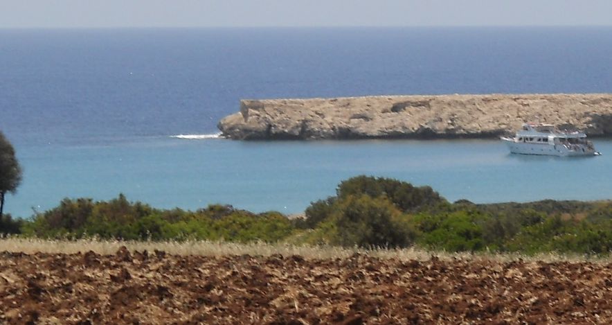 Bay in headland at northern end of Lara Bay