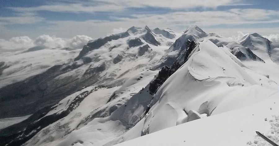 Summit view from the Breithorn above Zermatt in the Swiss Alps