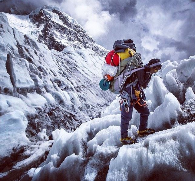 Sherpa ascending the Khumbu Ice Fall on the South Col Route for Mount Everest