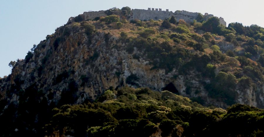 Palaiokastro and Nestors Cave from Voidokilia Bay near Pylos ( Pilos ) on the Greek Peloponnese