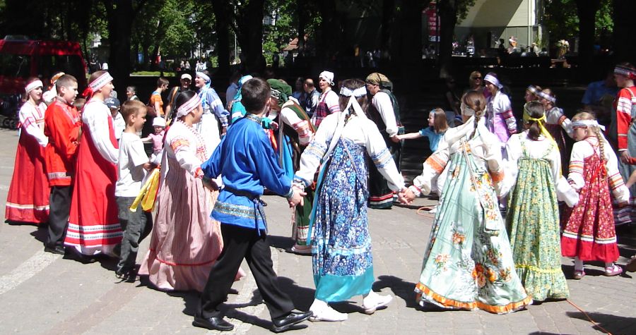 Folk Dancers in Latvian Traditional Costumes
