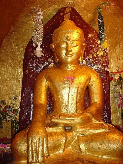 Buddha Statue in Shwezigon Paya in Nyaung U in central Myanmar / Burma