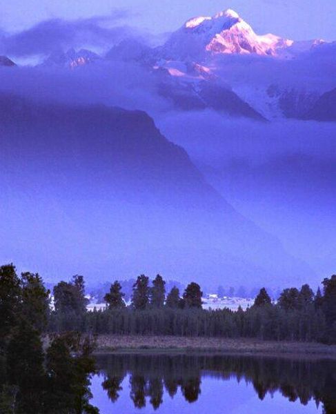 Mount Tasman from Matheson Lake near Fox Glacier Town on the South Island of New Zealand