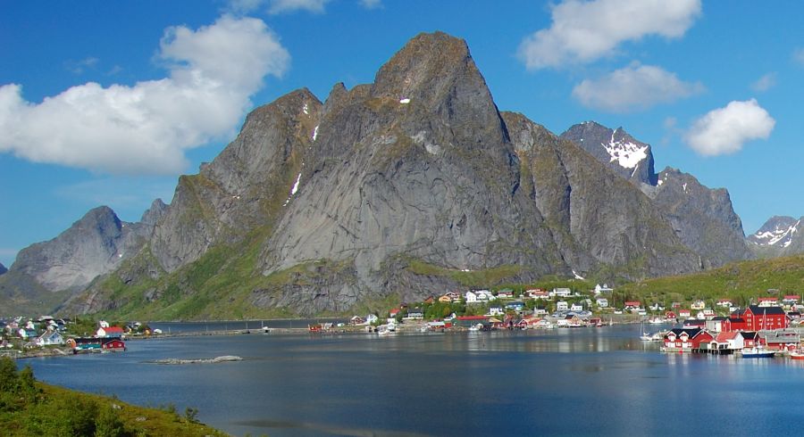 Mountains and Lofoten fishing village on Norwegian North Sea Coast
