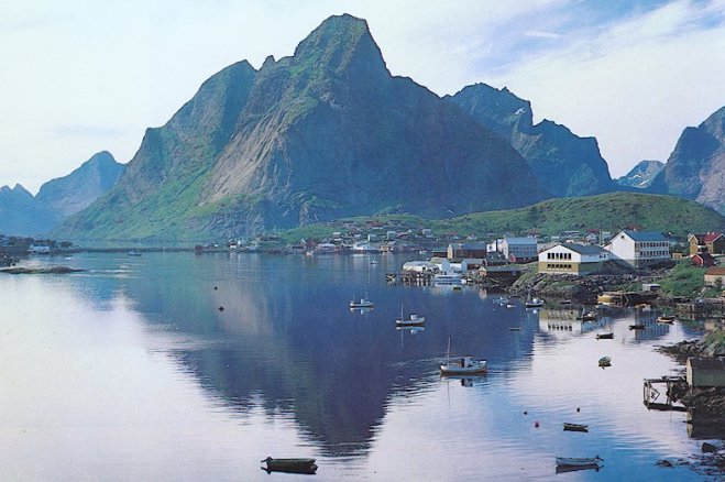 Mountains and Lofoten fishing village on Norwegian North Sea Coast