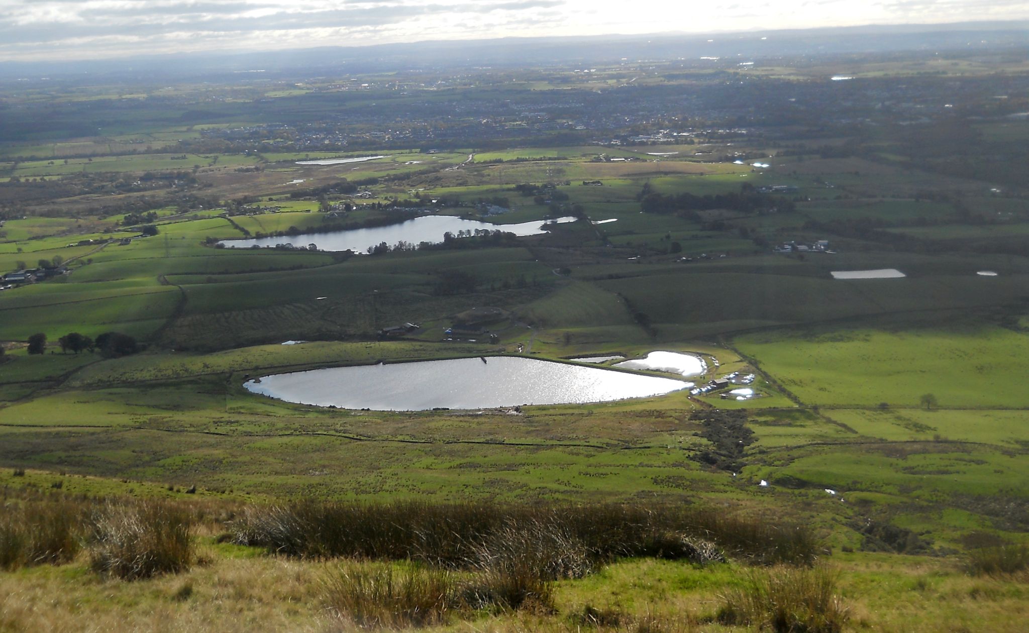 Woodburn Reservoir and Antermony Loch on descent from Brown Hill