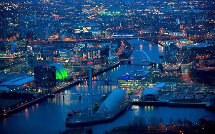 River Clyde illuminated at night in Glasgow, Scotland