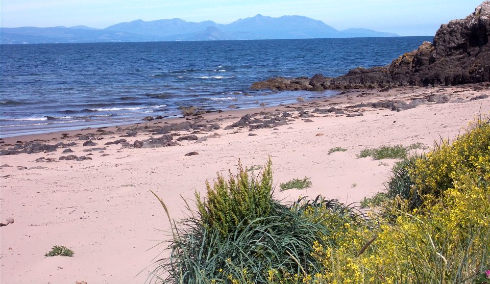 Hills of Arran from beach at Port Carrick at Culzean Castle Country Park