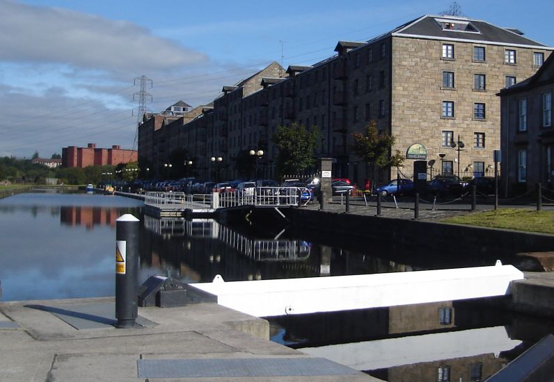 Former grain mills and stores converted to flats at Speirs Wharf, Port Dundas on the Forth and Clyde Canal in central Glasgow