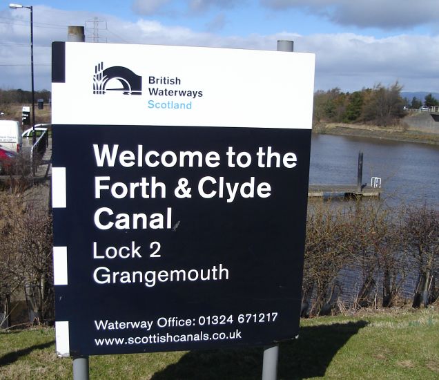 Signpost at entrance to The Forth and Clyde Canal at River Carron