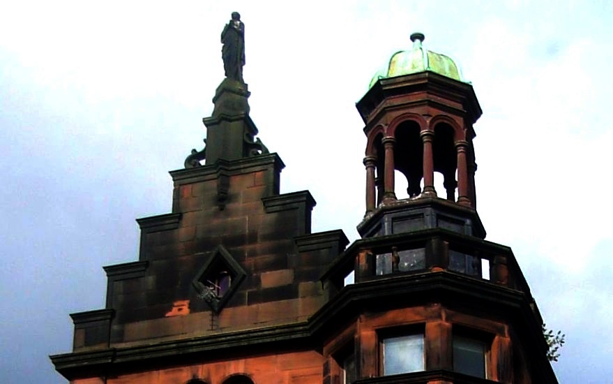 Statue and Tower on Old Tenement in High Street in Glasgow city centre