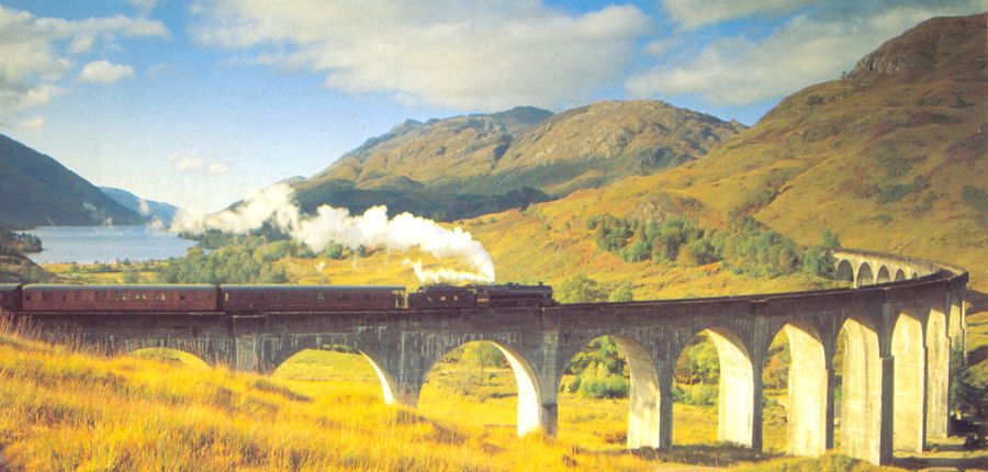 Steam Train on Glenfinnan Viaduct in Lochaber in Western Scotland