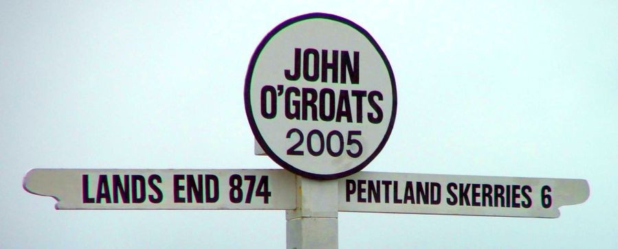 Signpost at John O'Groats on the Northern Coast of Scotland