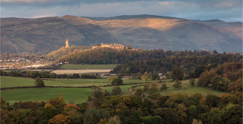 Wallace Monument and Stirling Castle beneath the Ochil Hills