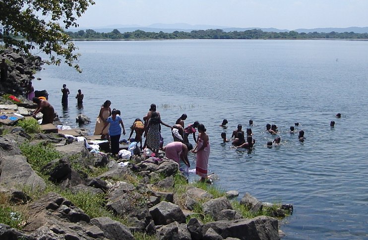 Bathers at Topa Wewa Lake in Polonnaruwa