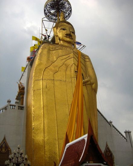 Standing Buddha at Wat Intharawihan in Bangkok
