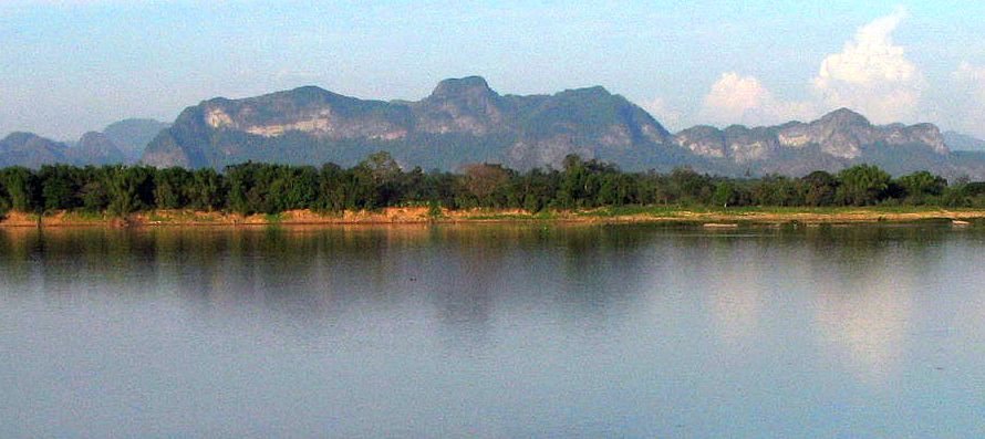 Laos hills across Maekong River from Nakhon Phanom in NE Thailand