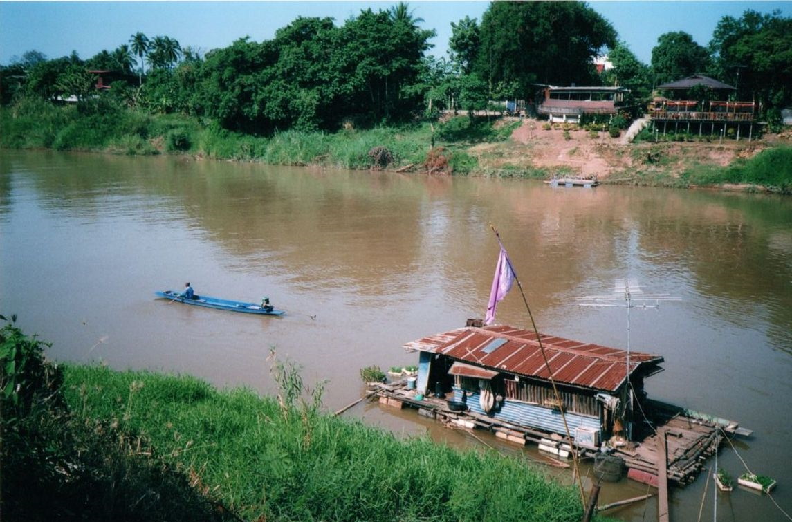 Houseboat on Nan River in Phitsanulok in Northern Thailand