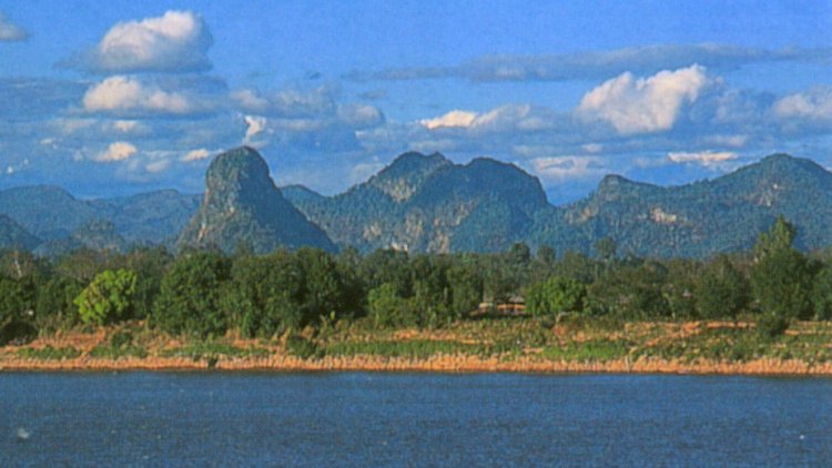 Laos hills across Maekong River from Nakhon Phanom in NE Thailand