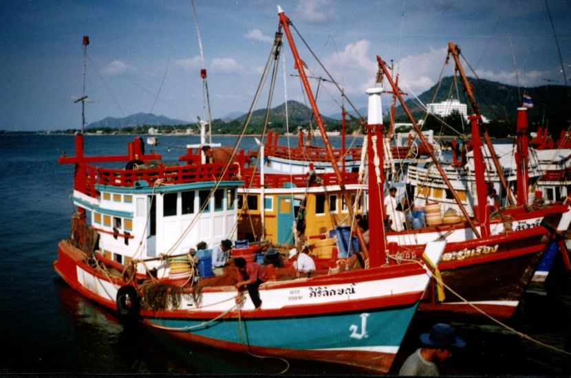 Thai Fishing boats in harbour at Prachuap Kiri Khan in Southern Thailand