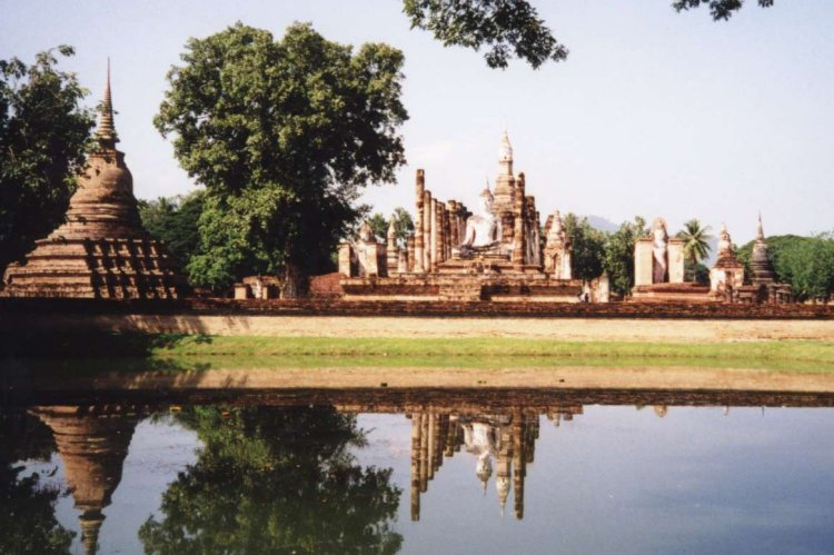 Chedi ( Buddhist Shrines ) at Sukhothai Historical Park in Northern Thailand