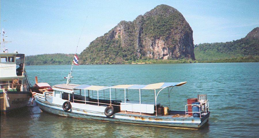 Boats at pier at Ban Pak Meng in Trang province in Southern Thailand