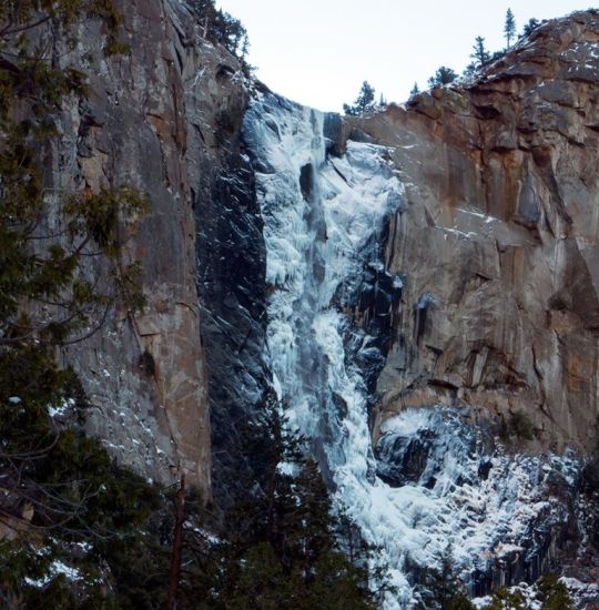 Bridalveil Falls frozen in winter in Yosemite Valley, California, USA