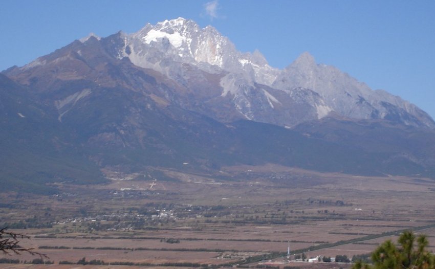 Jade Dragon Snow Mountain ( Yulong Xueshan ) from Elephant Hill ( Xiang Shan ) in Lijiang