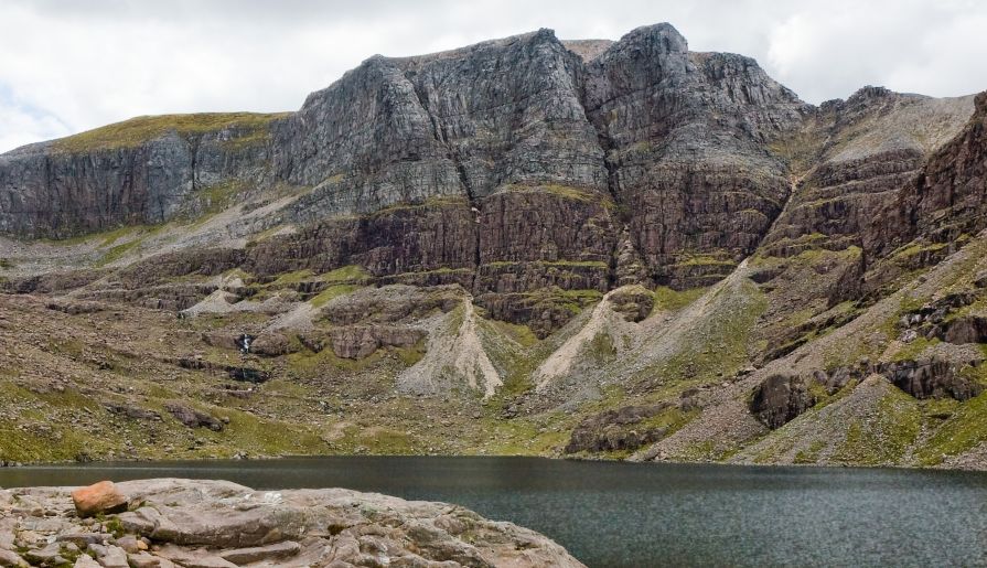 Coire Mhic Fhearchair beneath the Triple Buttress of Beinn Eighe in Torridon Region of NW Scotland