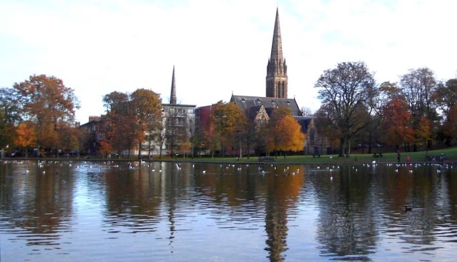 Boating pond and Queen's Park Baptist Church